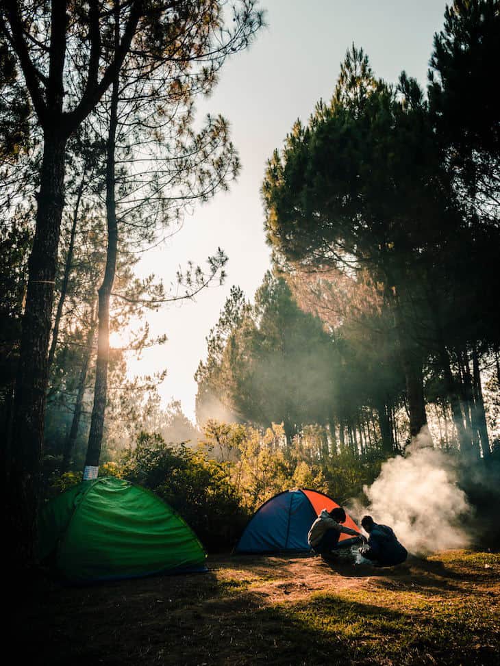 Campers burning stuff outside their tent