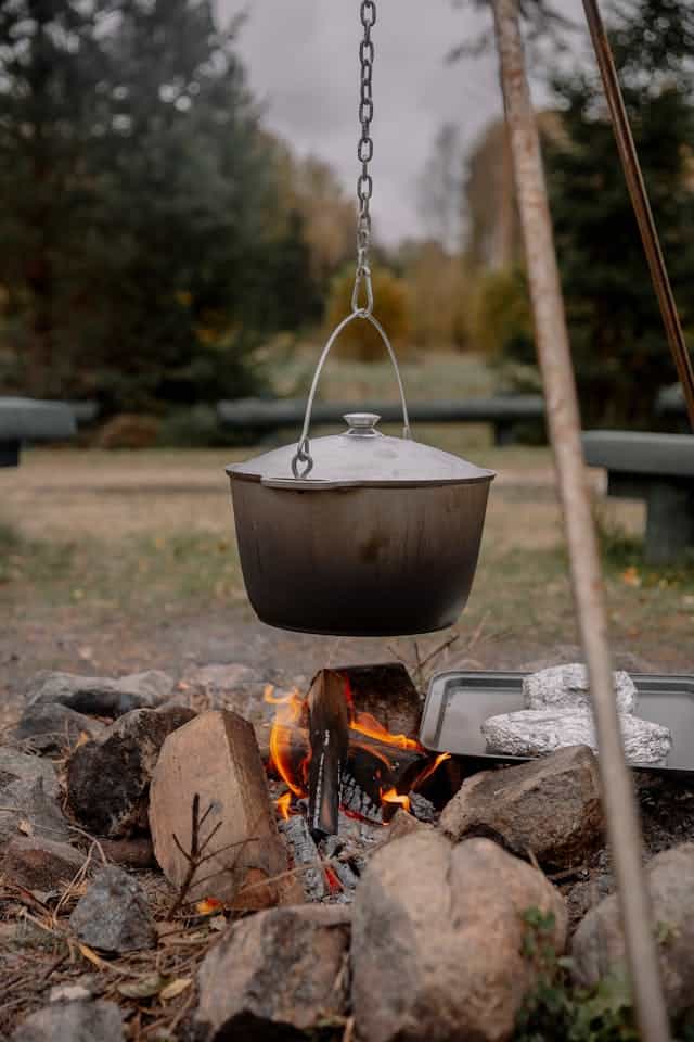Pot Hanging over Bonfire on Camping